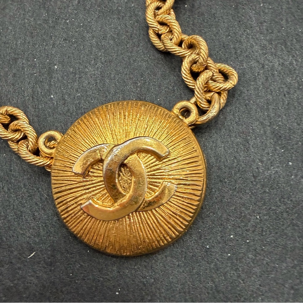 Radiant Gold Toned Chanel Pendant with a Chain bracelet - Picture 2 of 3
